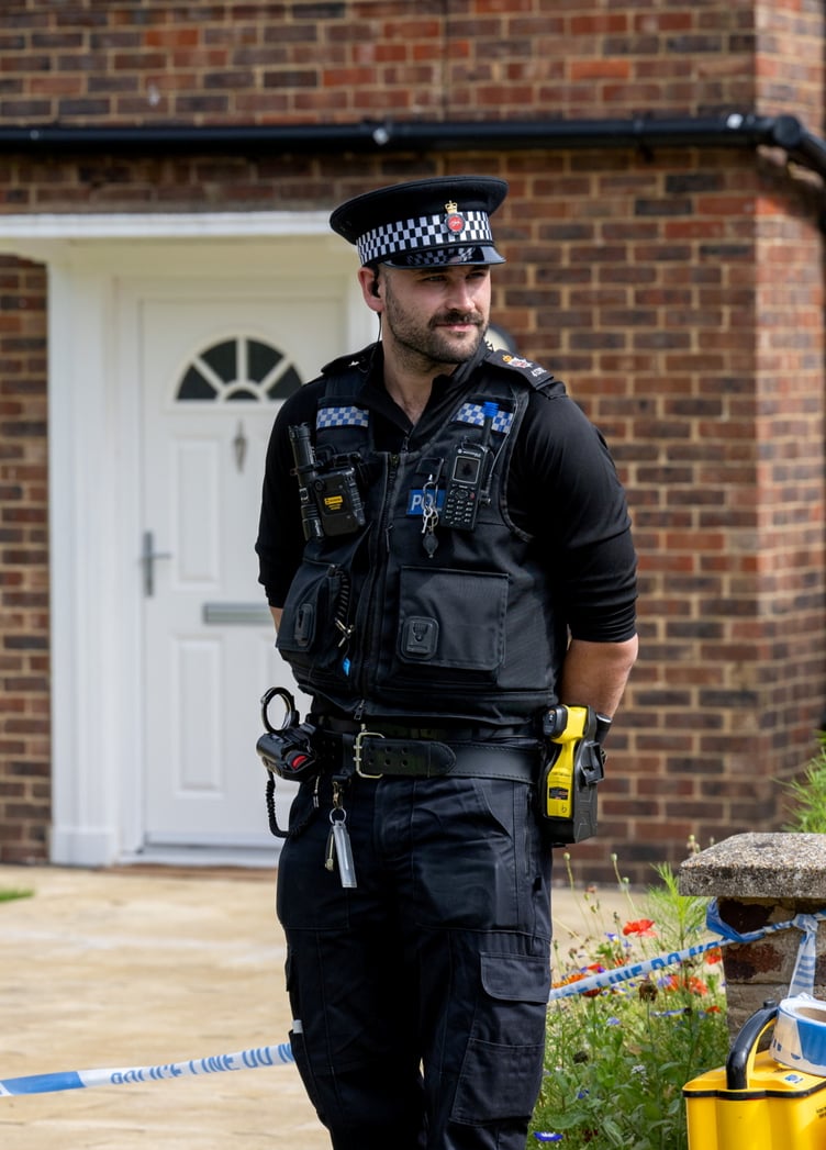 Police outside an address on Hammond Road, Woking, August 10, 2023