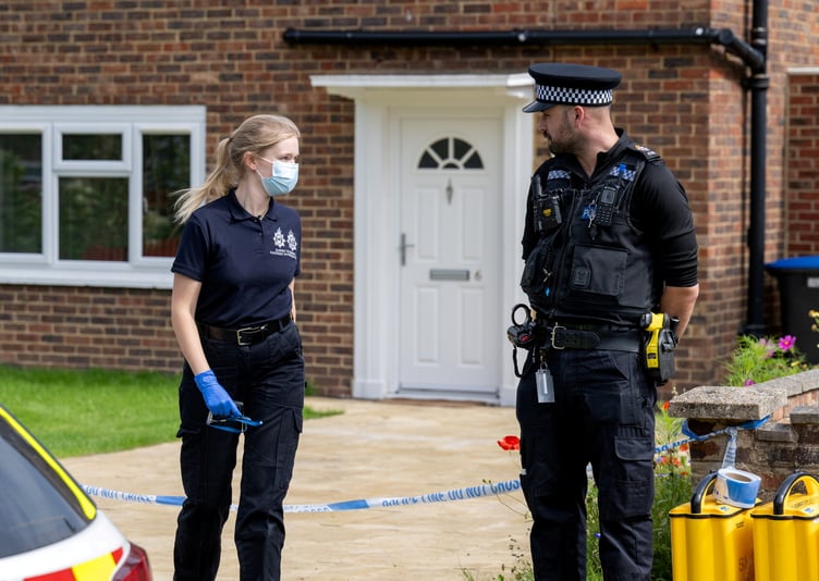 Police outside an address on Hammond Road, Woking, August 10, 2023