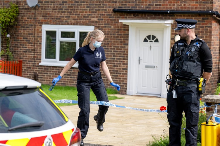Police outside an address on Hammond Road, Woking, August 10, 2023