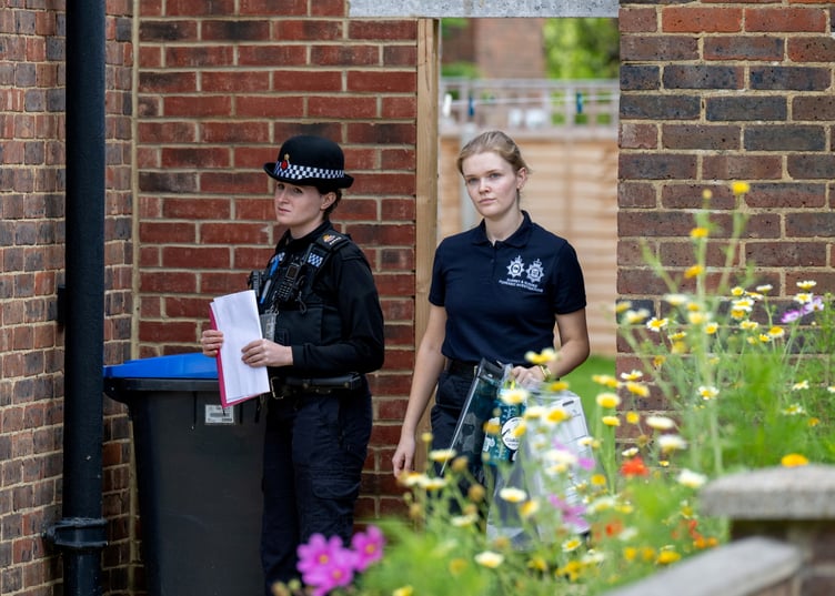 Police outside an address on Hammond Road, Woking, August 10, 2023