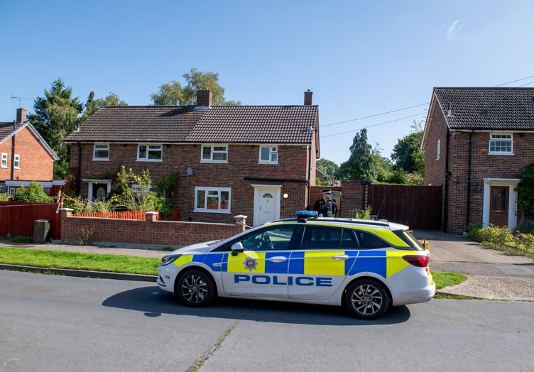 Police outside an address on Hammond Road, Woking, August 10, 2023