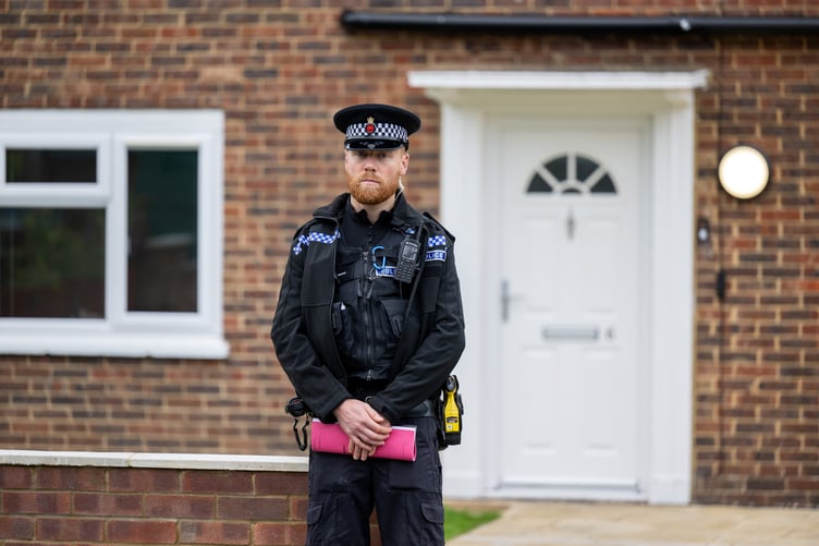 Police outside an address on Hammond Road, Woking, August 10, 2023