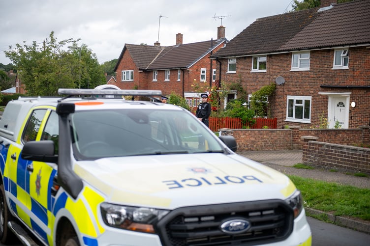 Police outside an address on Hammond Road, Woking, August 10, 2023