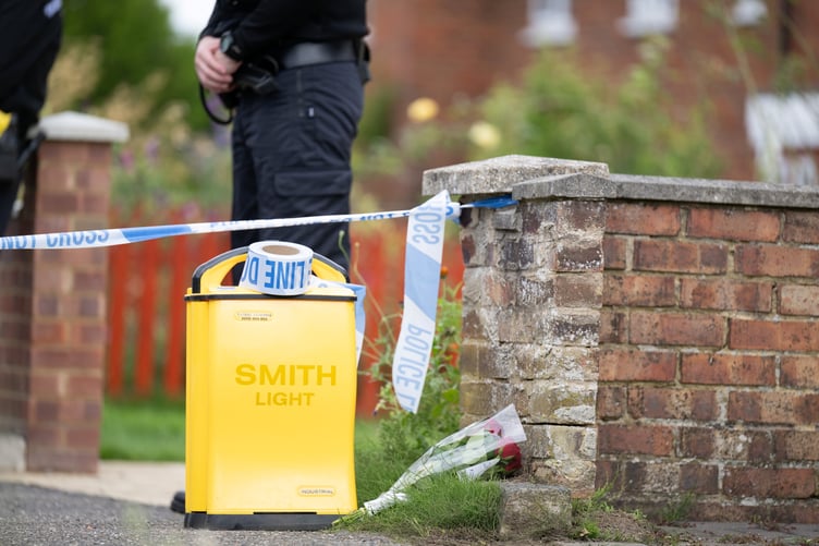 Police outside an address on Hammond Road, Woking, August 10, 2023