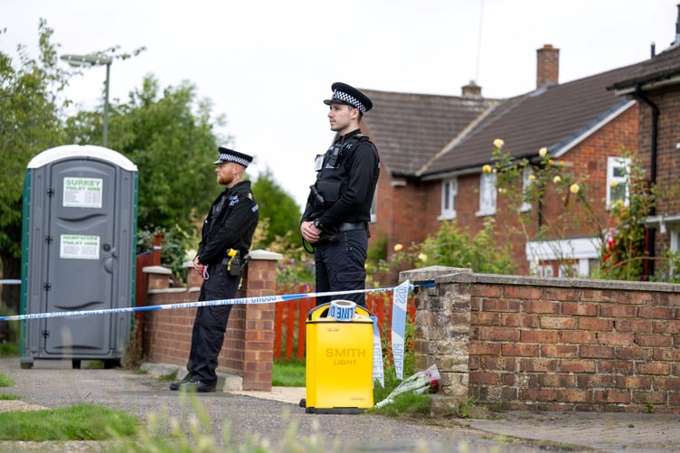 Police outside an address on Hammond Road, Woking, August 10, 2023