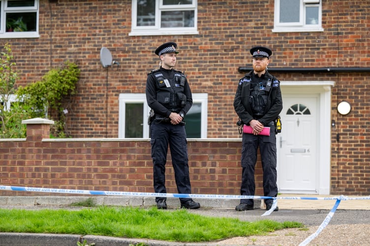 Police outside an address on Hammond Road, Woking, August 10, 2023