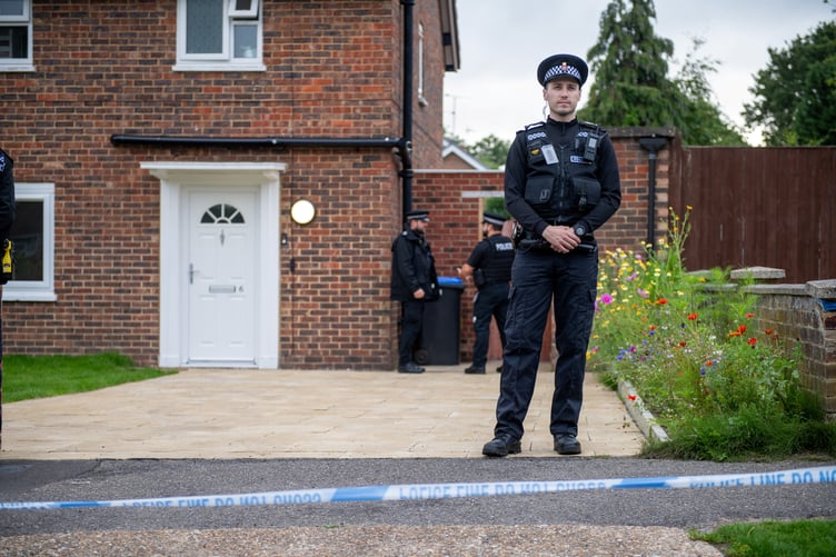 Police outside an address on Hammond Road, Woking, August 10, 2023