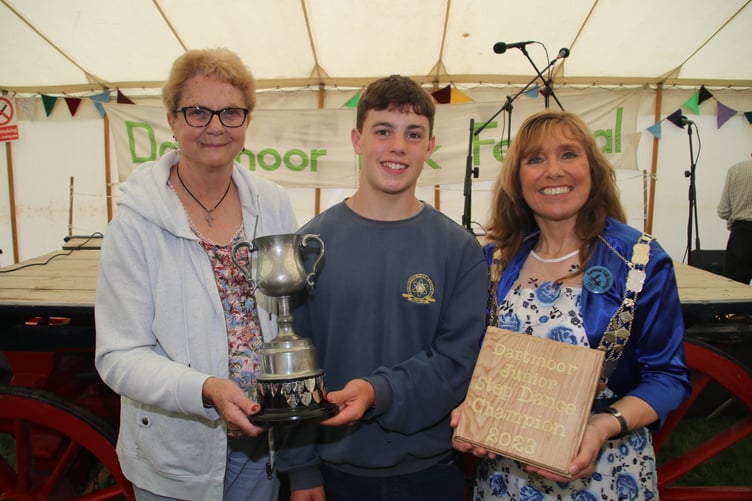 Stanley Frangleton receiving the Junior Step Dance Award from Shirley Bazeley, president, left, and the Mayor of West Devon, Cllr Lyn Daniels.
