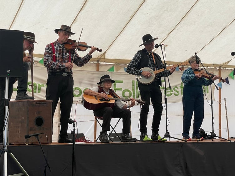 Musicians on stage.  AQ 4285