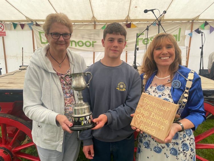 Stanley Frangleton receiving the Junior Step Dance Award from Shirley Bazeley, president, left, and the Mayor of West Devon, Cllr Lyn Daniels.  AQ 4382