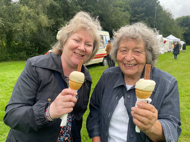 Enjoying an ice cream at the festival. AQ 4395