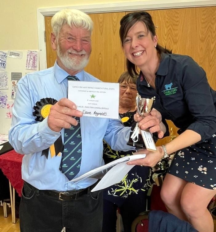 Elaine Reynolds receiving the cup for best vegetable exhibit