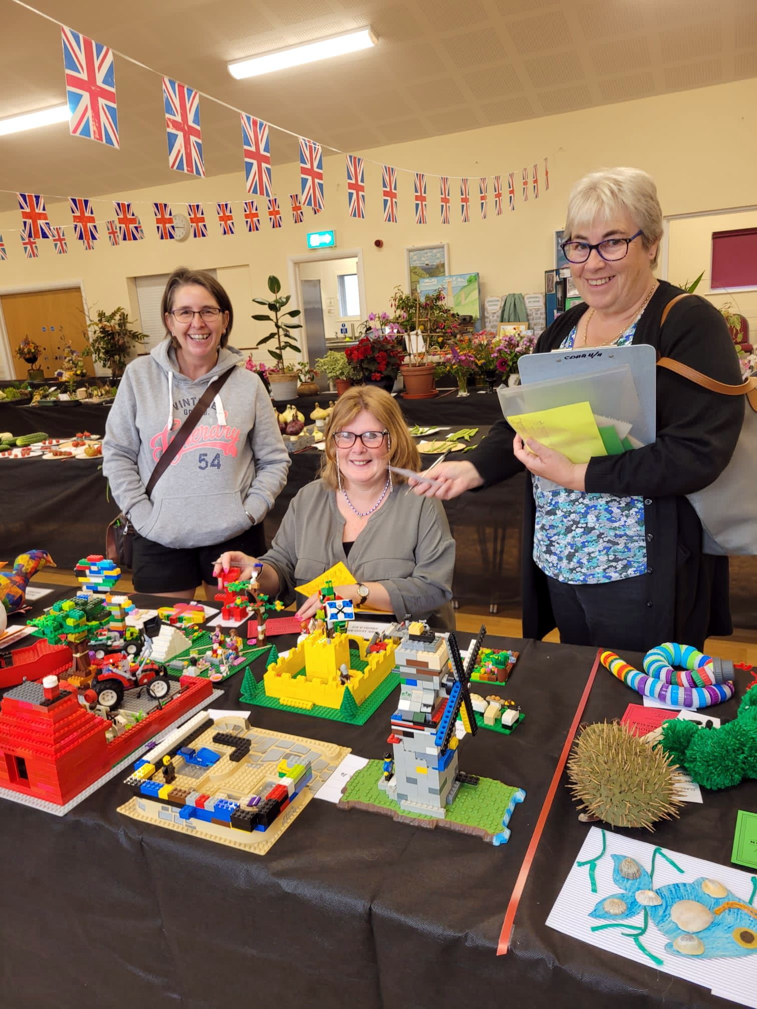 Children’s handicraft judges Caroline Binney and Sharon Cousins with steward Jenny Sleep