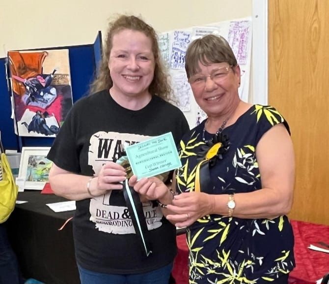 Sharon Claridge receiving the cup for Delilah the duck