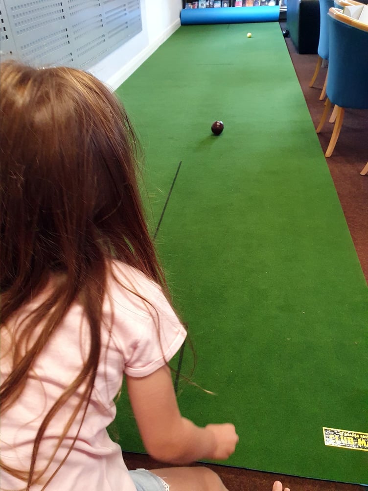 Carpet bowls at during the Crediton Library Summer Reading Challenge.