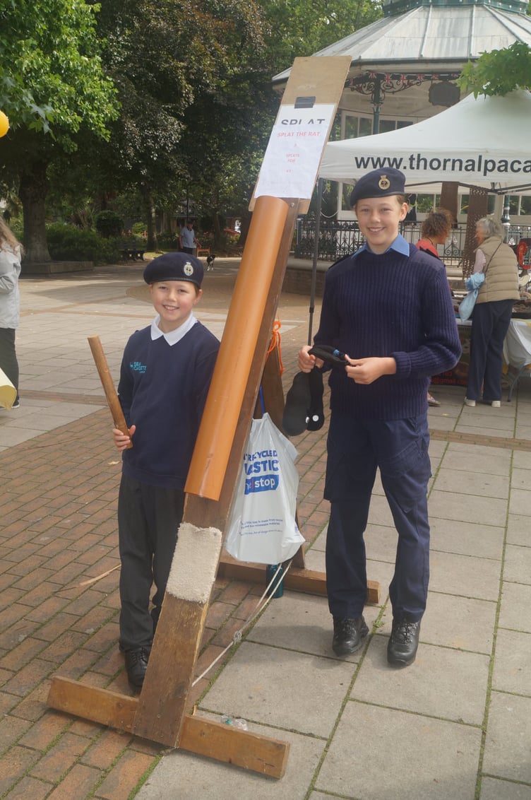 Fred and Abigail from Dartmouth Sea Cadets help run the ‘Splat the Rat’ game