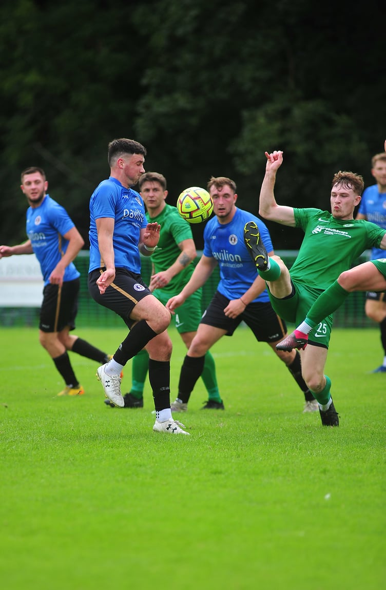 Action from the South West Peninsular League. Ivybridge Town versus Newton Abbot Spurs