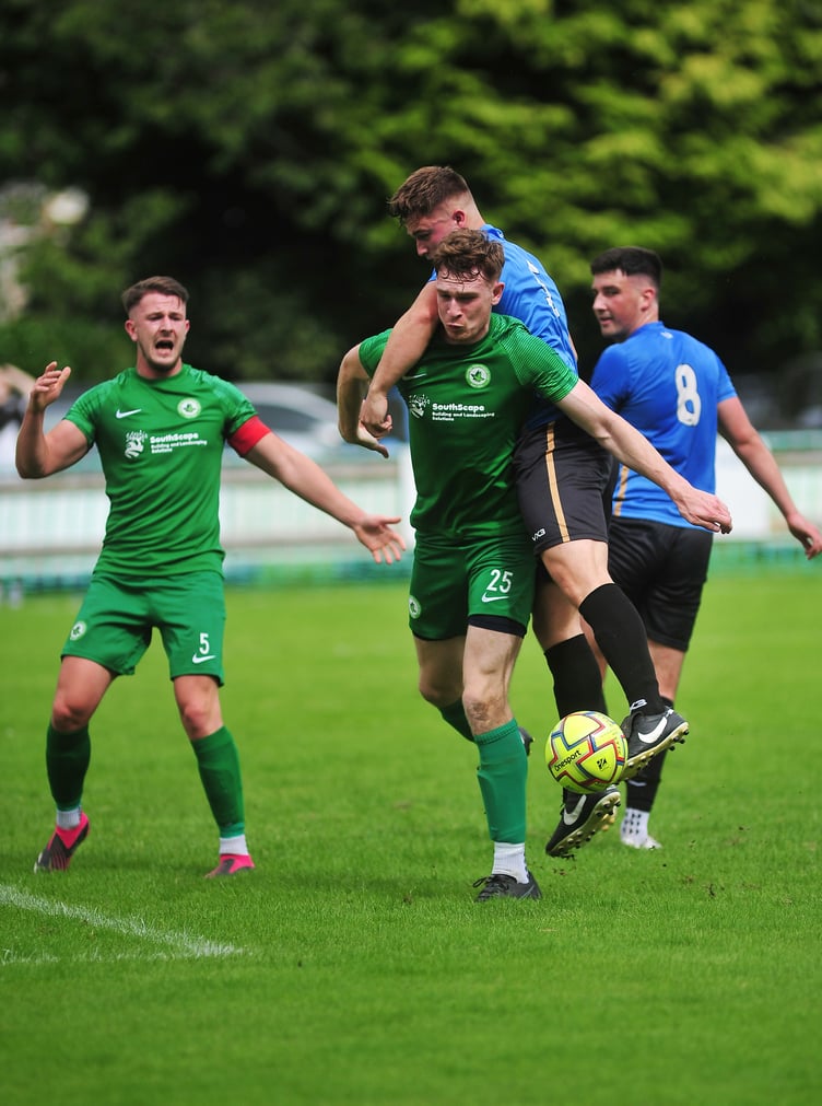Action from the South West Peninsular League. Ivybridge Town versus Newton Abbot Spurs