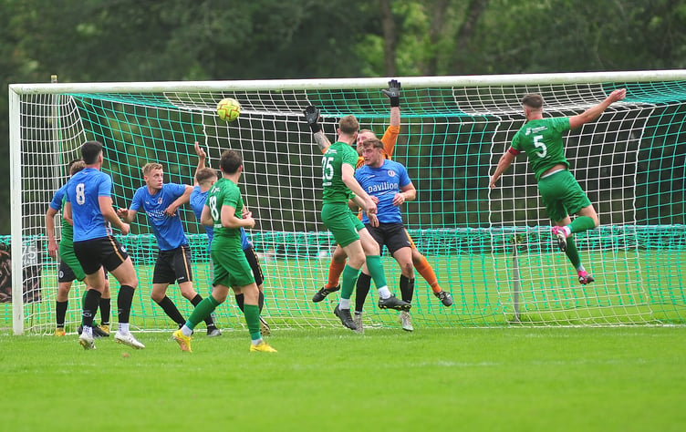 Action from the South West Peninsular League. Ivybridge Town versus Newton Abbot Spurs