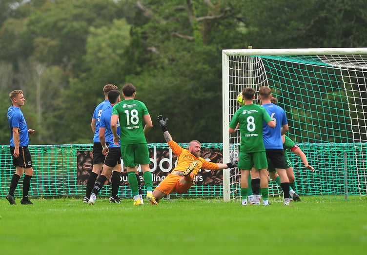 Action from the South West Peninsular League. Ivybridge Town versus Newton Abbot Spurs