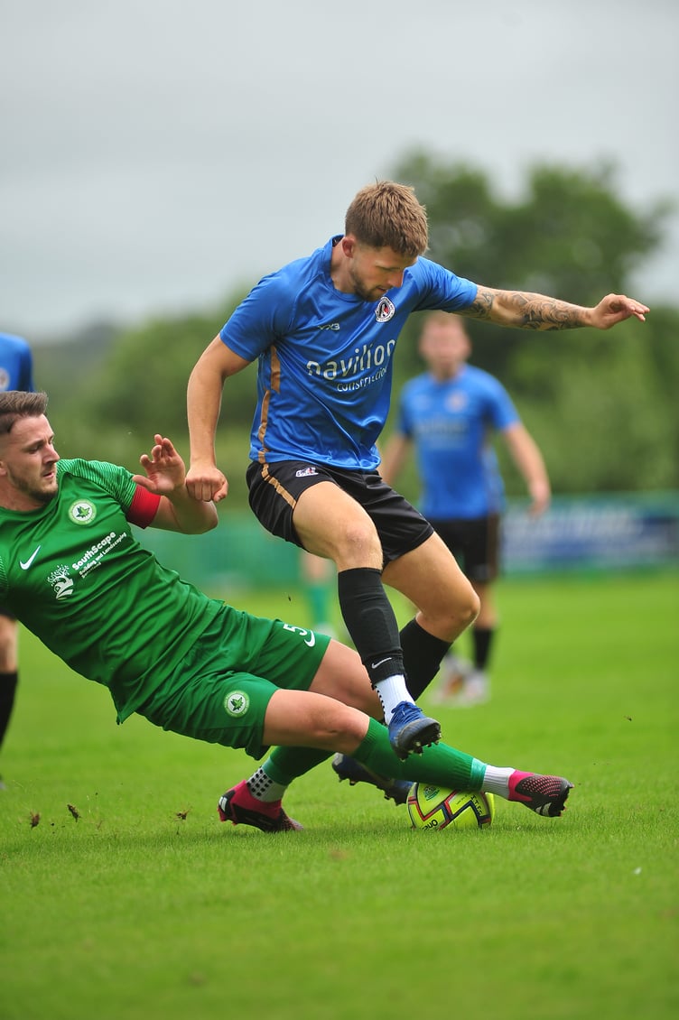 Action from the South West Peninsular League. Ivybridge Town versus Newton Abbot Spurs