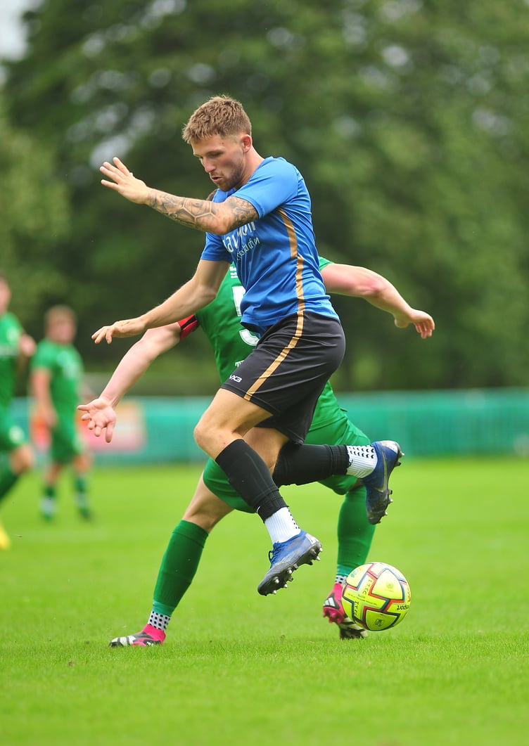 Action from the South West Peninsular League. Ivybridge Town versus Newton Abbot Spurs