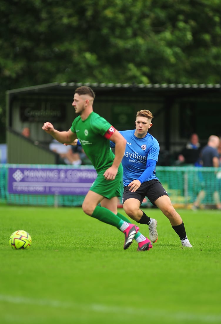 Action from the South West Peninsular League. Ivybridge Town versus Newton Abbot Spurs