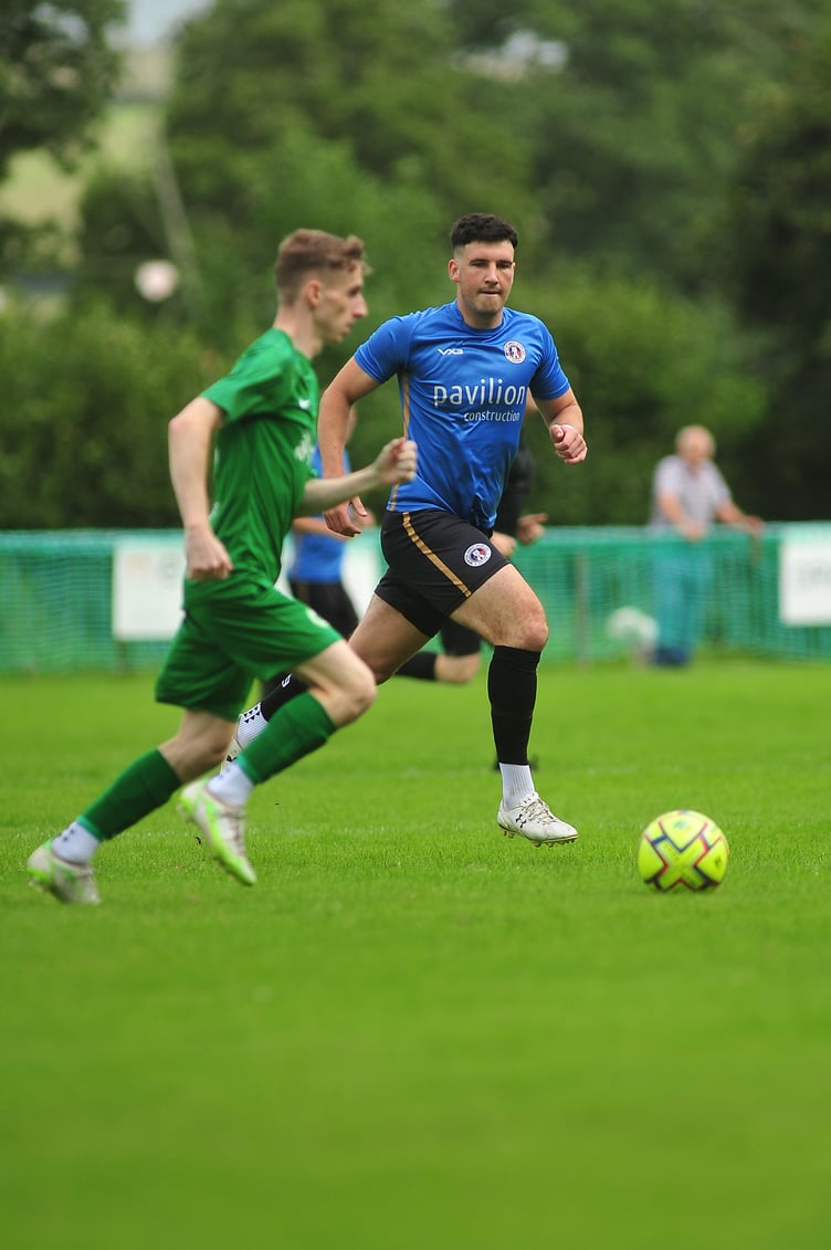 Action from the South West Peninsular League. Ivybridge Town versus Newton Abbot Spurs