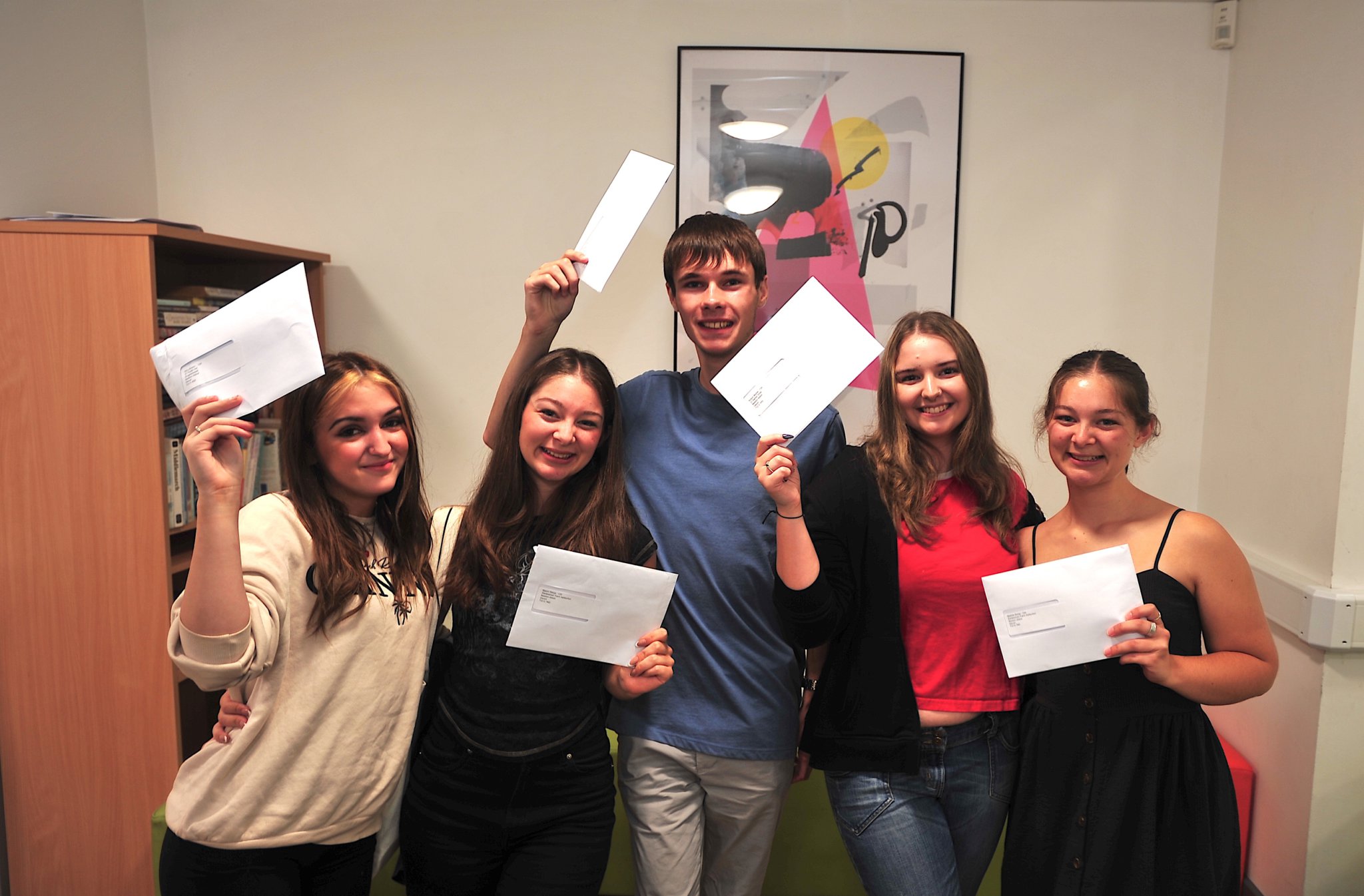 Students awaiting to open their A-Level results at Coombeshead Academy in Newton Abbot.