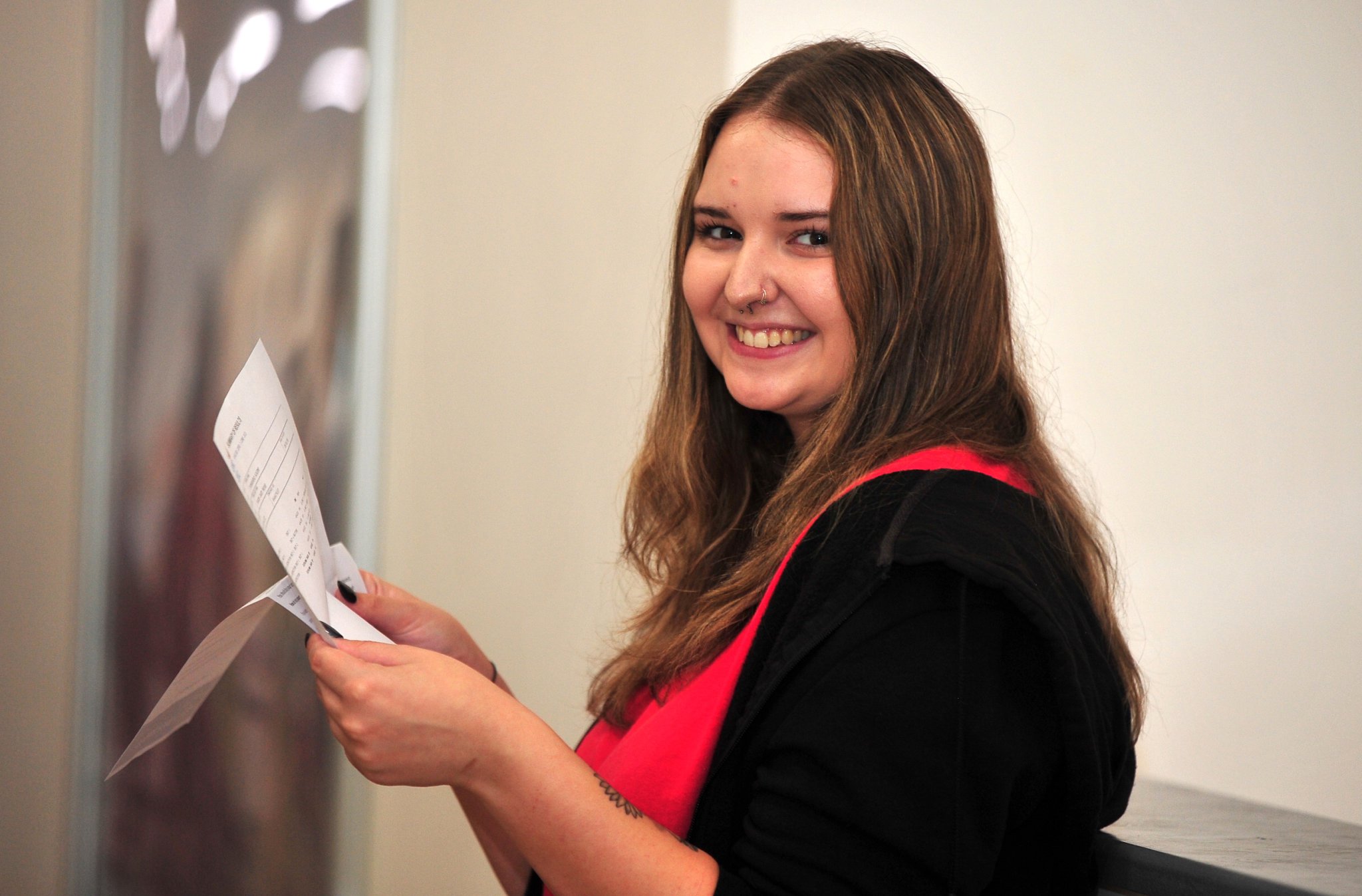 A-Level results at Coombeshead Academy in Newton Abbot. Robyn Moore is hoping her results will soon have her out and working.
‘I’ve got a distinction in Food Tech amnd a pass in Criminolgy which I’m happy with,’ she said.
‘My aim now is to forge  a career path in the hospitality business in the not too distant future.’