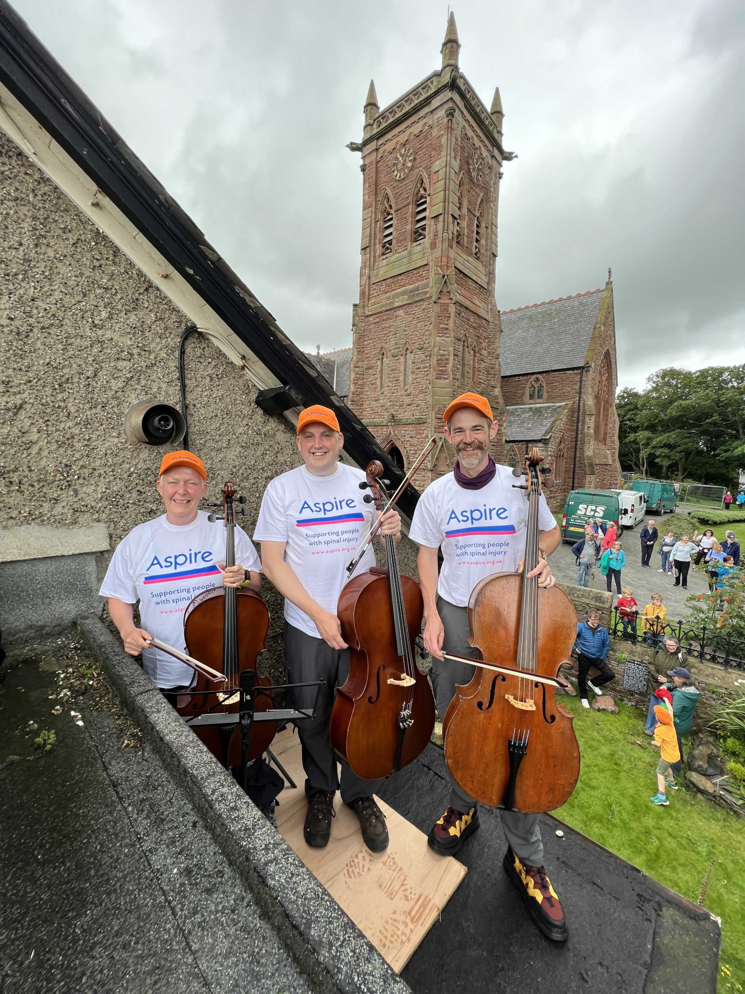 Clare, Jeremy and James on the roof of Corrin Hall at Peel Cathedral