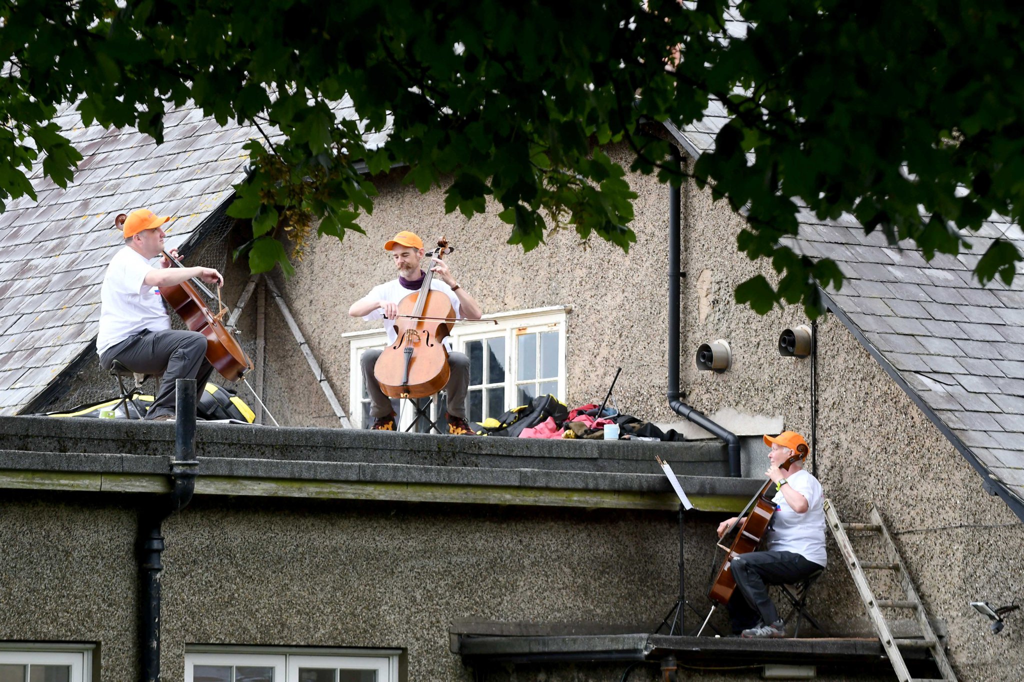 The Extreme Cellists play on the roof of Corrin Hall in Peel Photo: Dave Kneale