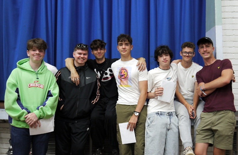 Alex, James, Jake, Jay, Ashton, Oliver and Ben collecting their results
