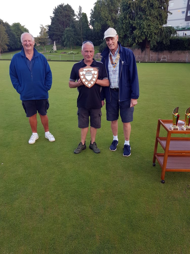 The Rotary President with Richard Jones of RJ Tyres, team captain of the winning team.