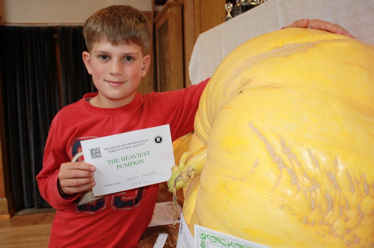 Henry Flower and his 173lb pumpkin at the 2010 autumn show