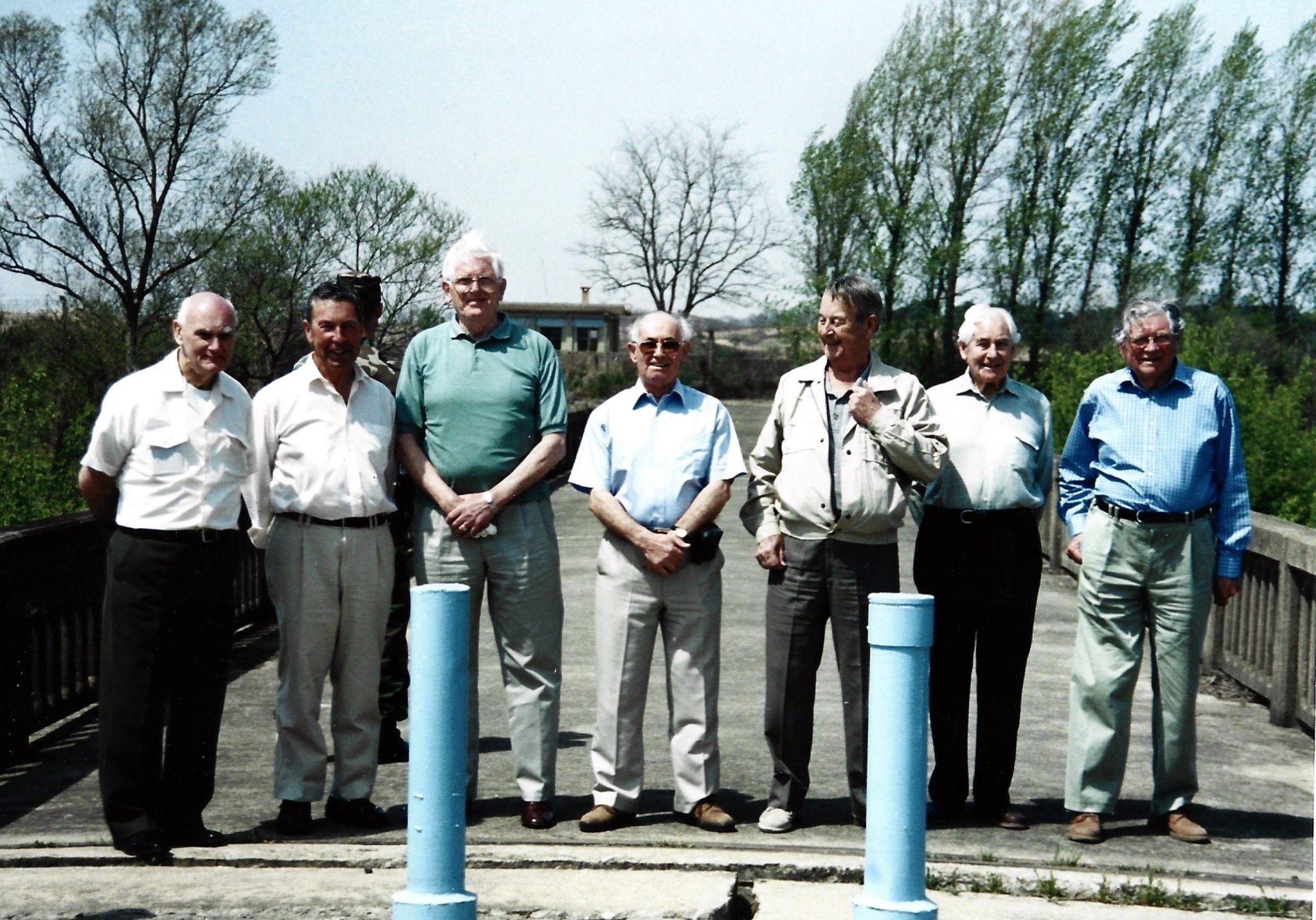 ABOVE: Maurice Bradshaw stood on the Freedom Bridge or “The Bridge of no Return” in Korea in 2011. This was the bridge over which all the POWs came to be repatriated. Being allowed to stand on the bridge today was very irregular occurrence.
