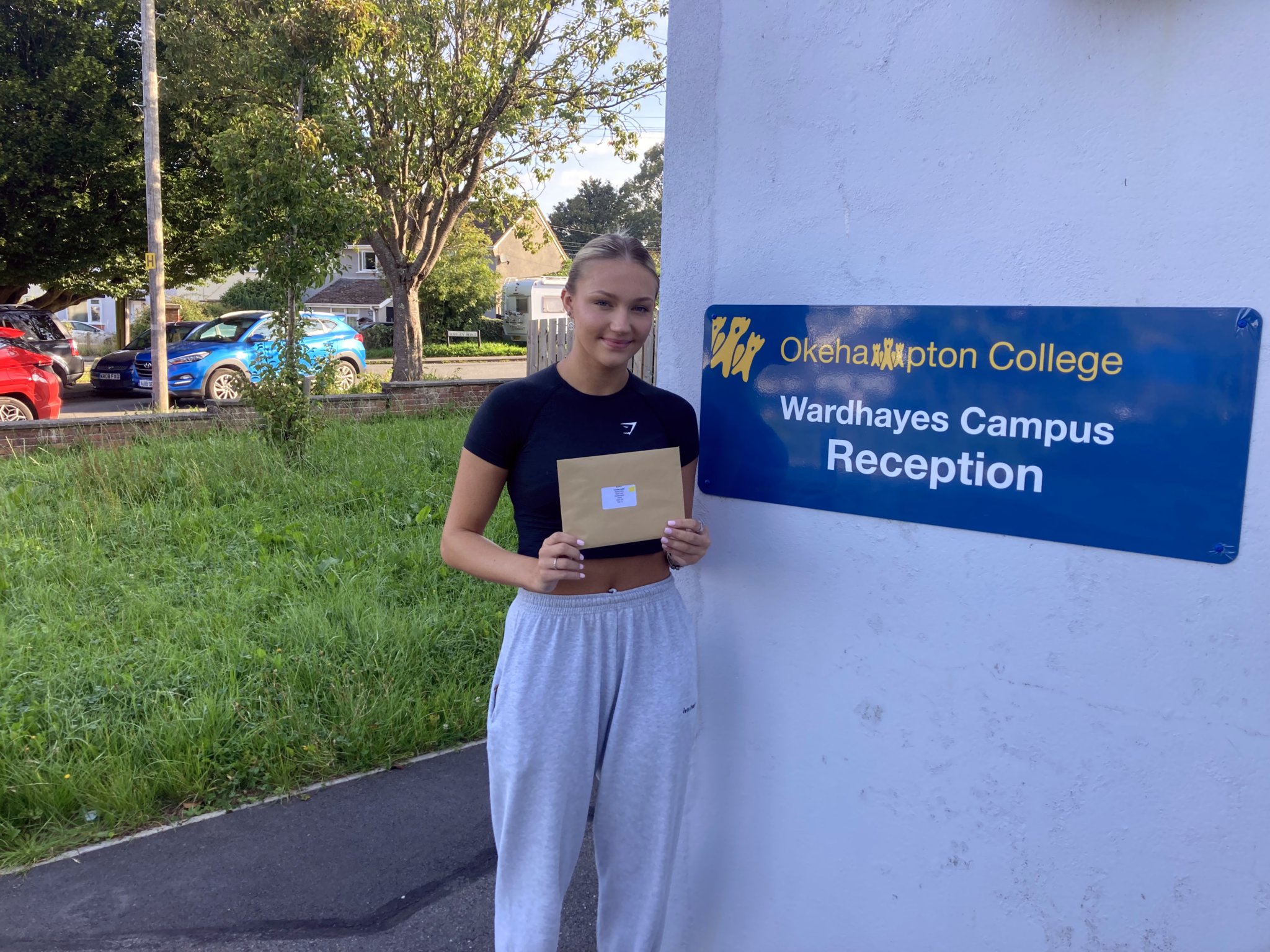 ABOVE RIGHT: Louisa Lynn from Okehampton College who achieved a Distinction *, A and A. BELOW: George McLaughlin and Shannon Howell at Tavistock College received 3 A*s.