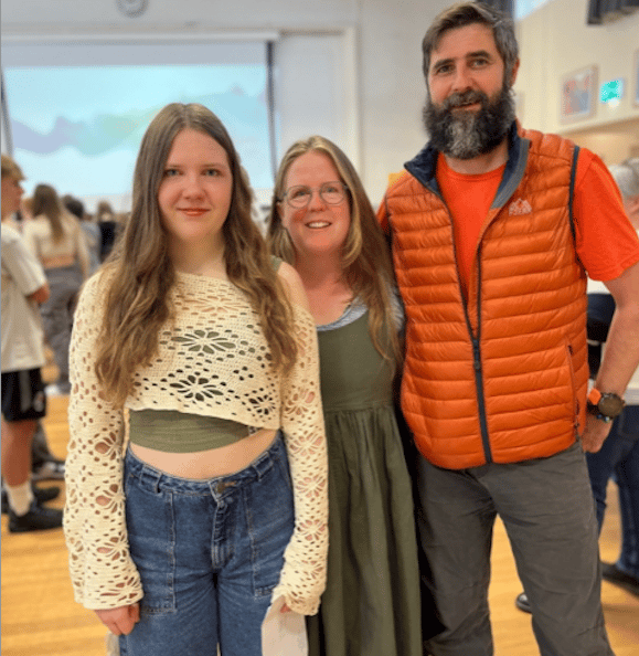 Erin Blazey with her parents.