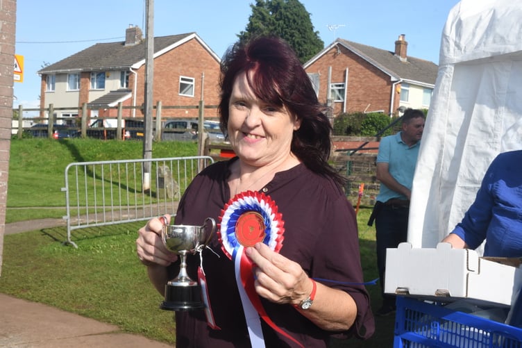Teresa Barnett won the Farmer & Clark Cup for most handicraft points