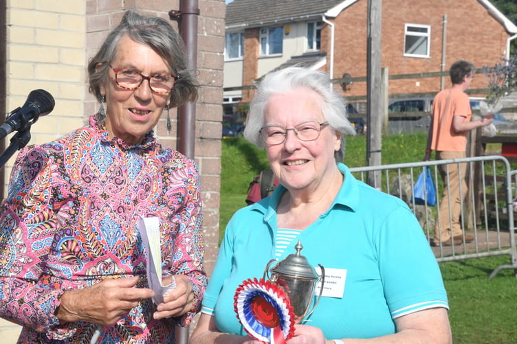 Margaret Kidby won the Williams and Cotton Cup for most points in the domestic section. It waas presented by show president Diana Standing. *** Local Caption *** Margaret Kidby won the Williams and Cotton Cup for most points in the domestic section. It waas presented by show president Diana Standing.