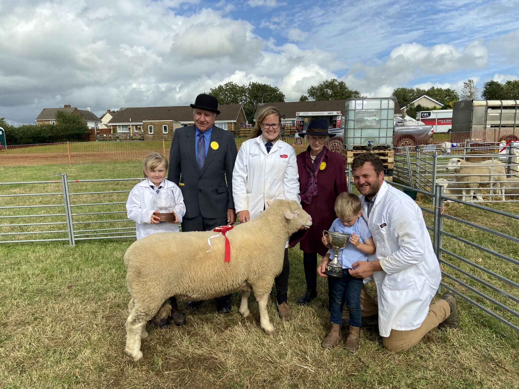 It was a good day for the Hutchings family of Launceston as they came away with a plethora of rosettes and finished the day with the cups for male champion, overall points and supreme champion. Jess, Gareth and their children Evie and Sam are pictured receiving the supreme champion trophy from this year’s show presidents Mrs Tina Drowne and Mr Roger Mitchell
