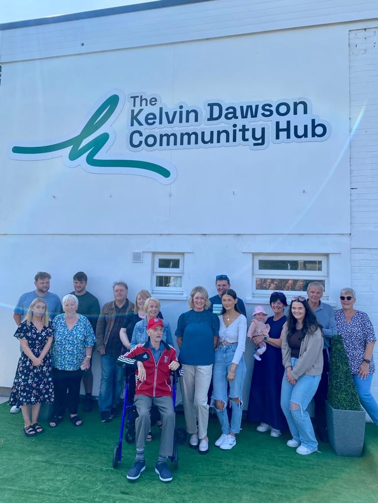 Marie Dawson and Roly Haughton cut the ribbon to open the facility. Supported by family of Kelvin, Tommy Clucas and Roly.