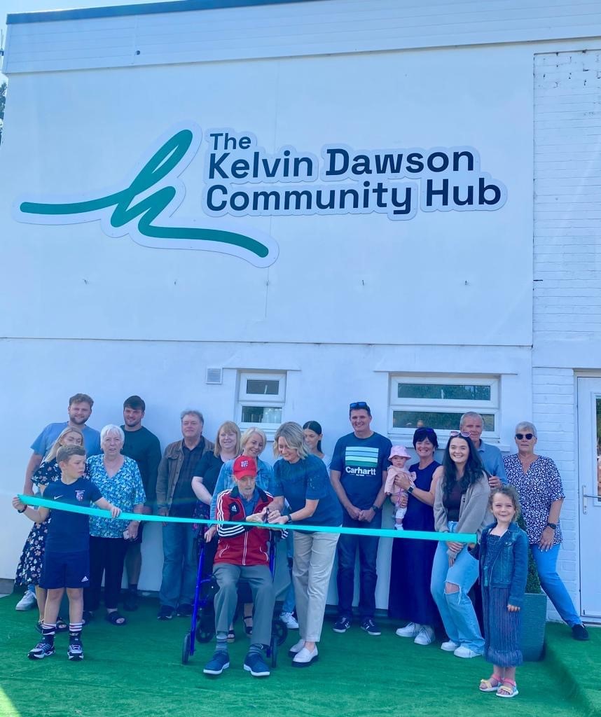 Marie Dawson and Roly Haughton cut the ribbon to open the facility