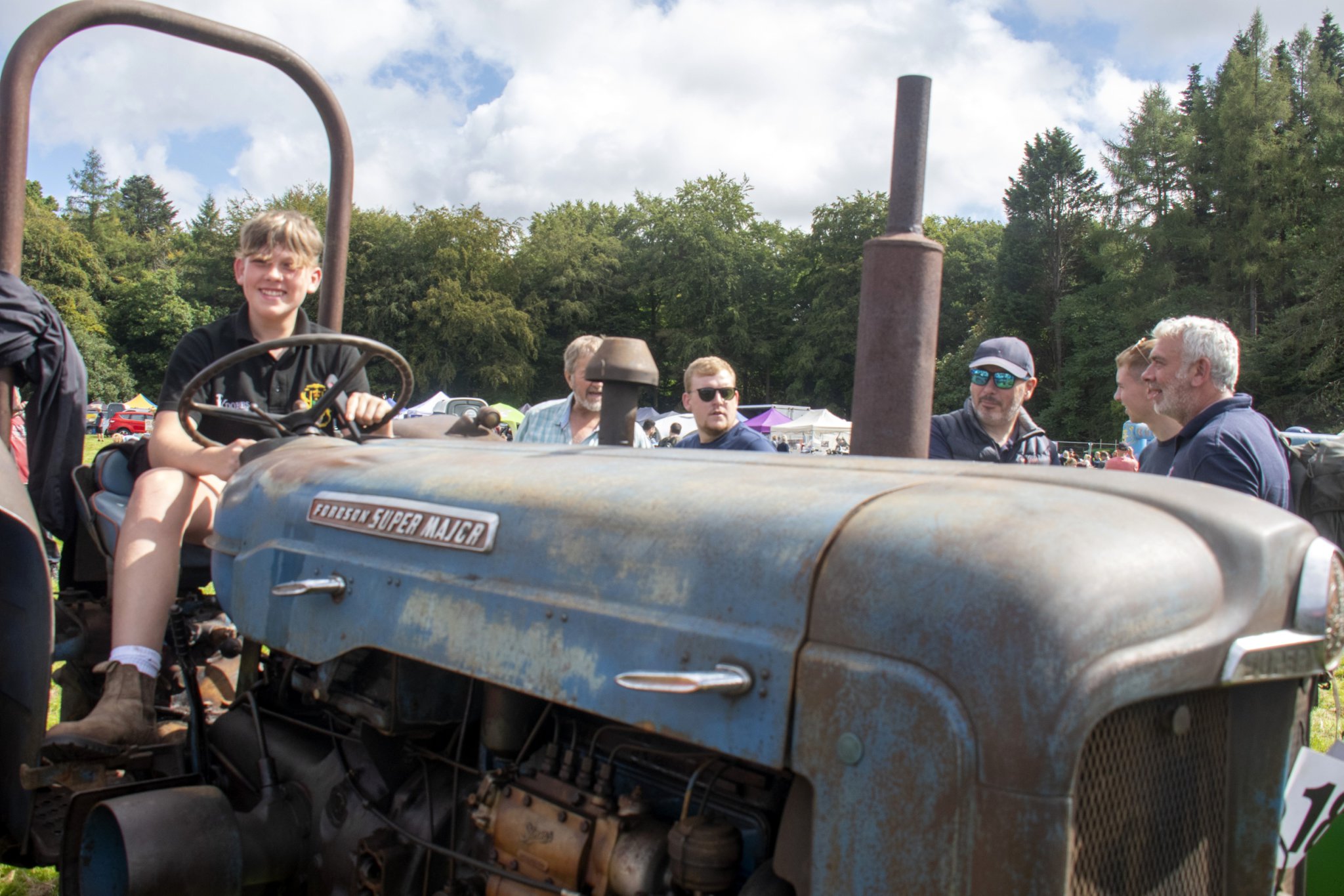 Noah James on board a Fordson Super Major tractor.