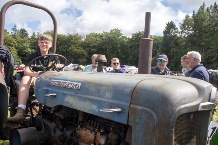 Noah James on board a Fordson Super Major tractor.