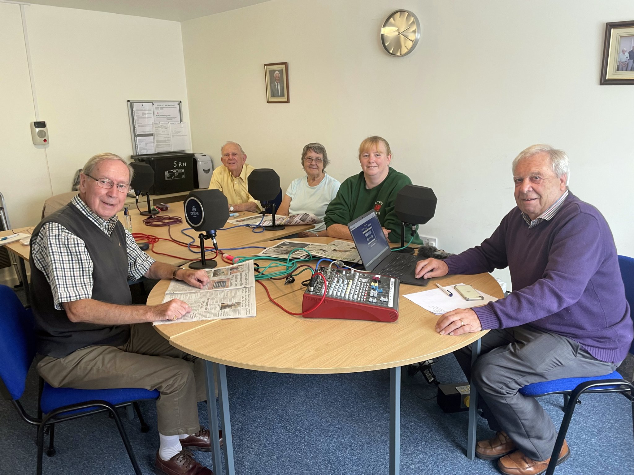 Tricia Sail, second right, during her recording for Crediton Talking News, pictured with the volunteer readers, from left, Eric Parkes, David Dornom and Bronwyn Nott, and right, Peter Bryan. AQ 4754