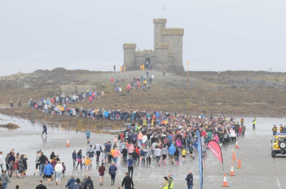 Public walk to the Tower of Refuge during a low spring tide -