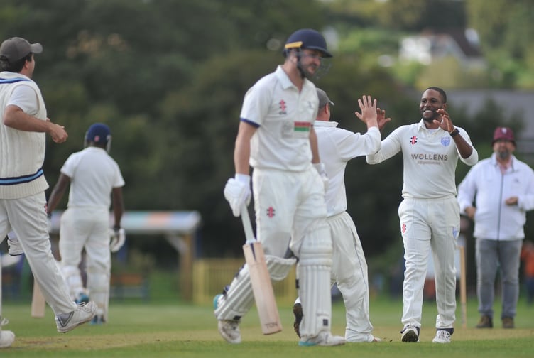 Devon Cricket League D Division West. Chelston & Kingskerswell versus South Devon. Happy times for South Devon's Mali Marshall as he bowls out C&K's Ollie McManus