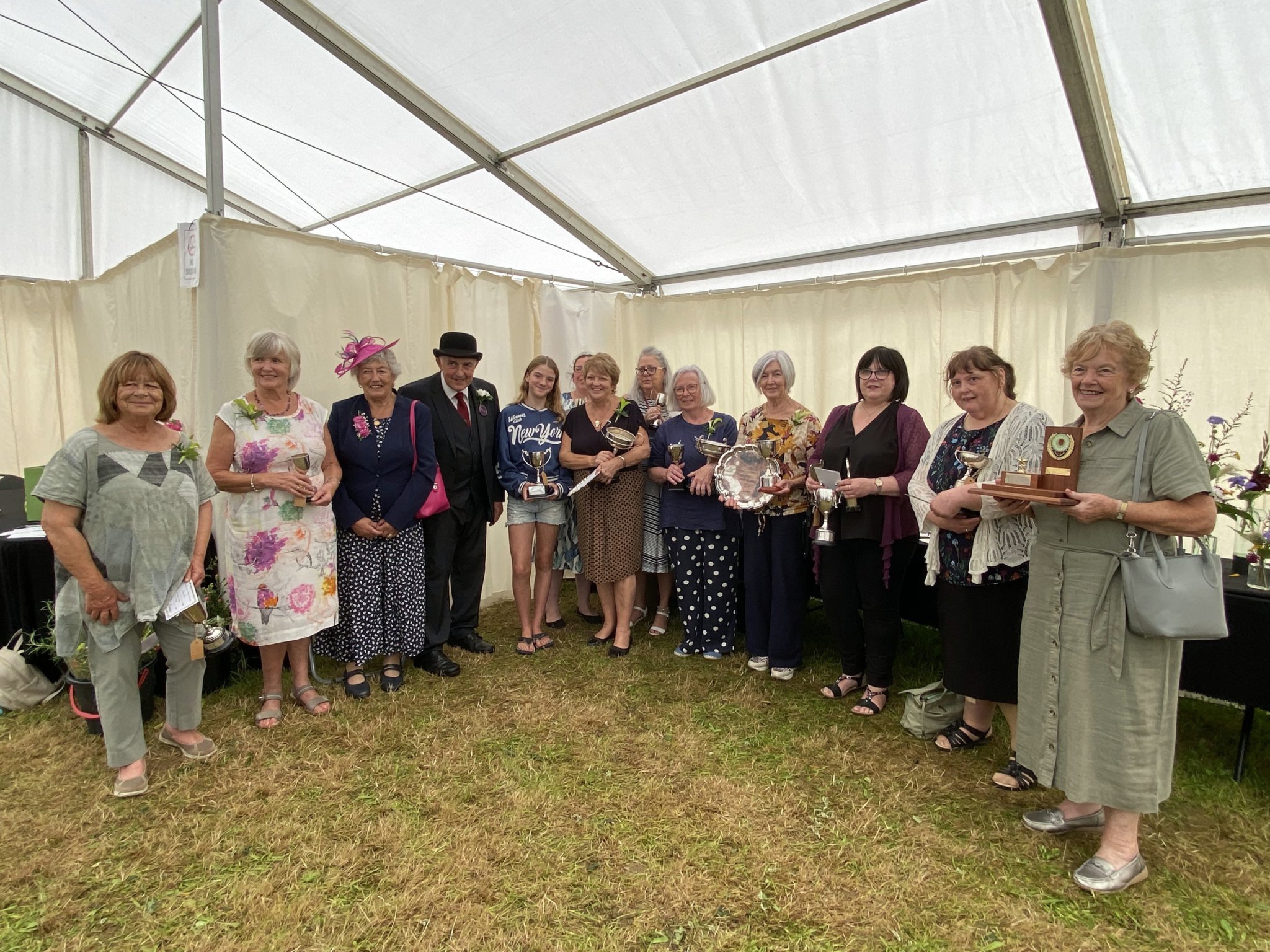 Pictured here is all the winners who were presented with cups for the flower show.