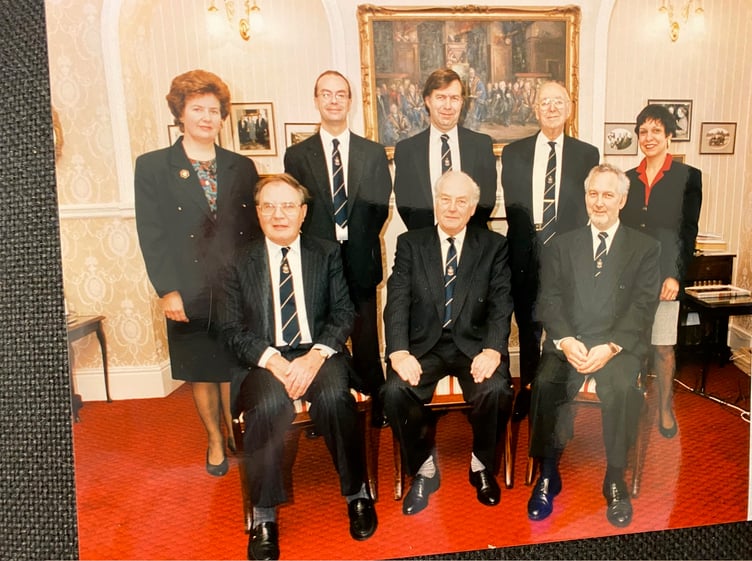 Wendy with the Tindle company’s top team, standing next to Sir Ray’s son Owen – now the company chairman –with Sir Ray in the centre of the front row